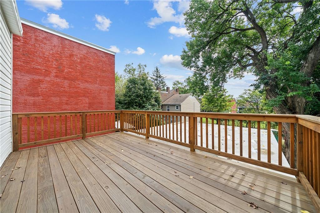 1431 Adams Street Pittsburgh, PA 15233 - Photo 38 of 42 a view of deck with wooden floor and fence