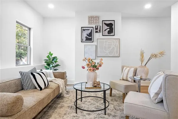 a living room with furniture and window