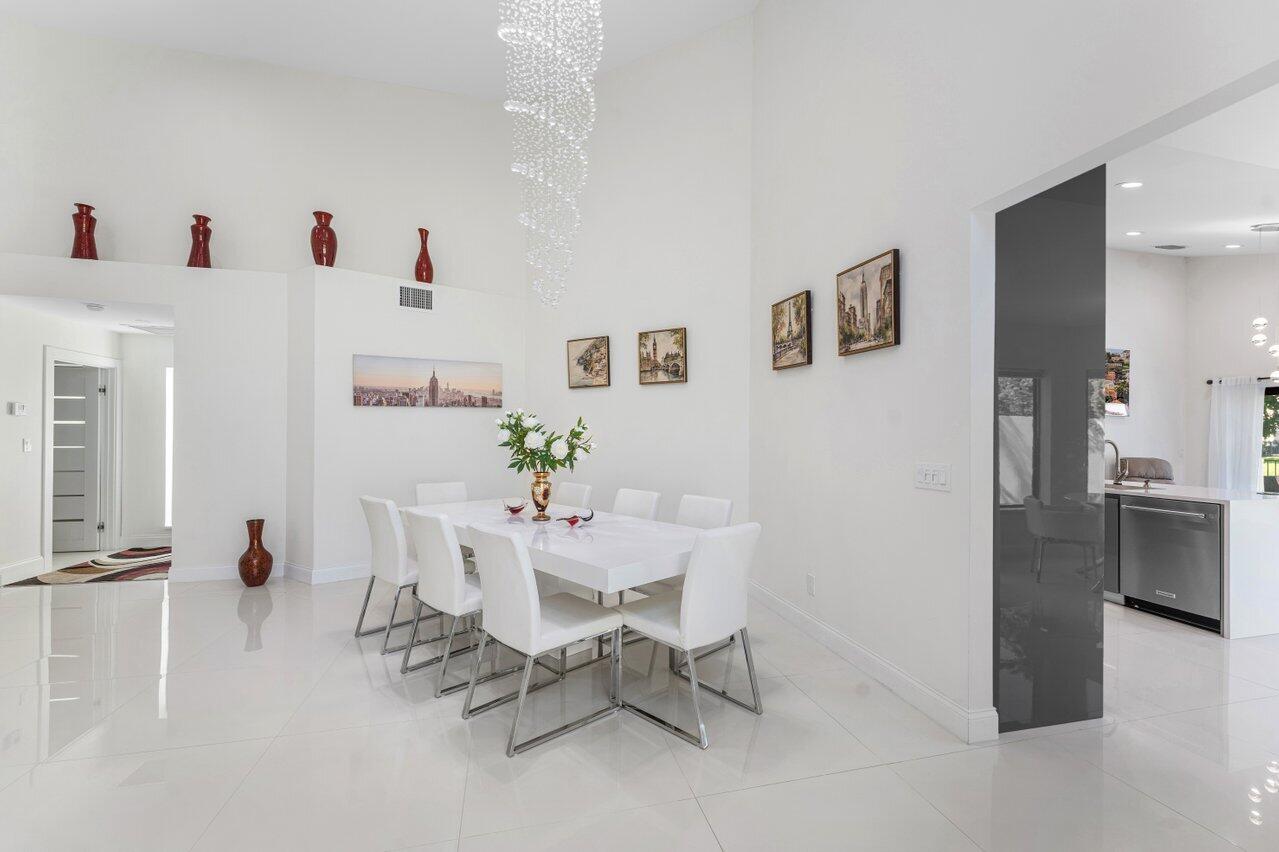 23419 Mirabella Circle South Boca Raton, FL 33433 - Photo 6 of 57 a view of kitchen with furniture and refrigerator