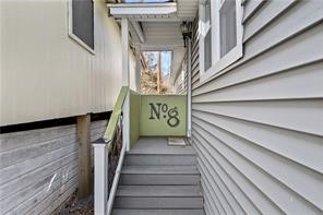 5025 Lake Road, Unit 8 Williamson, NY 14589 - Photo 2 of 22 up the stairs to the front door