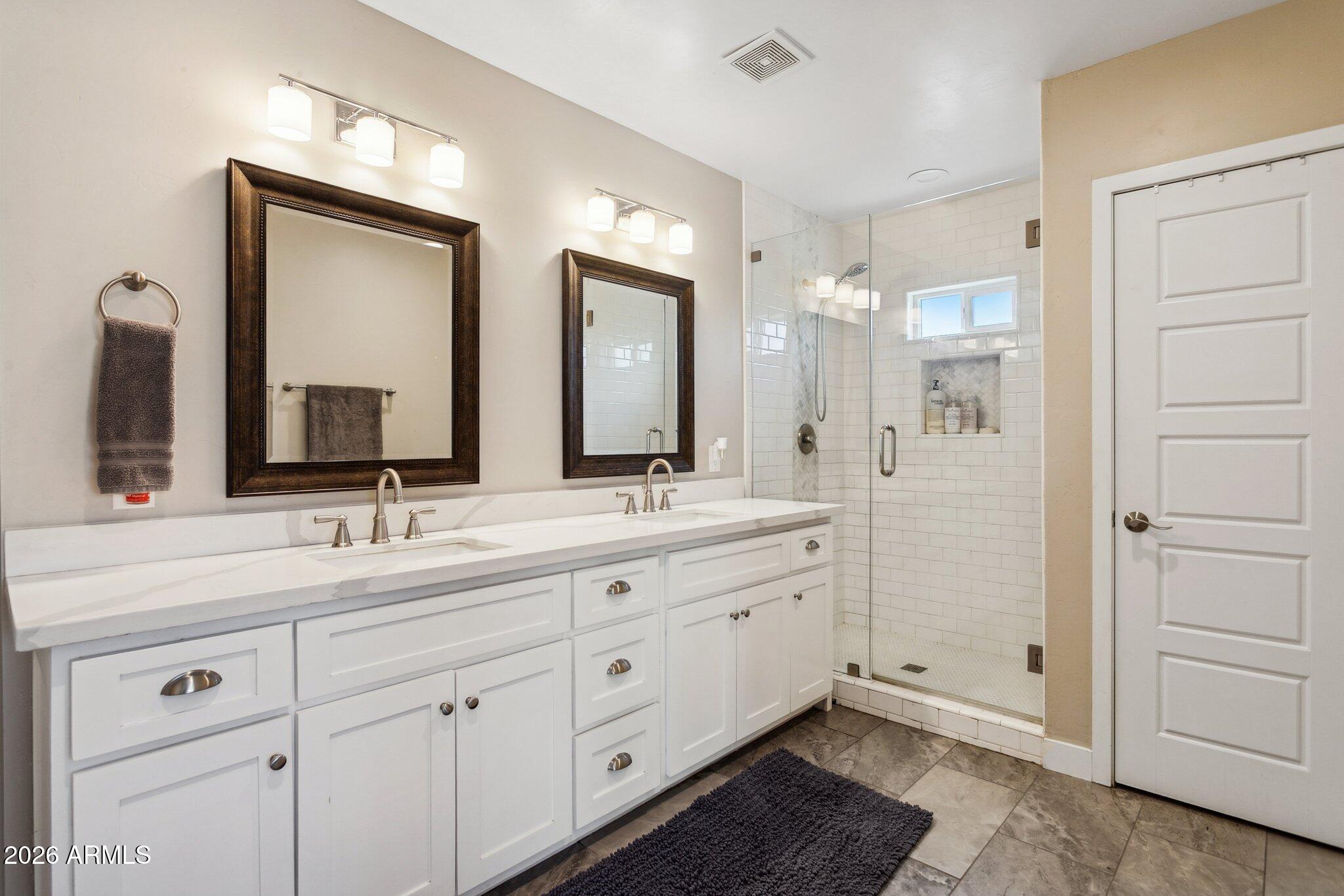 322 West Coronado Road Phoenix, AZ 85003 - Photo 21 of 93 a bathroom with double sink and a mirror