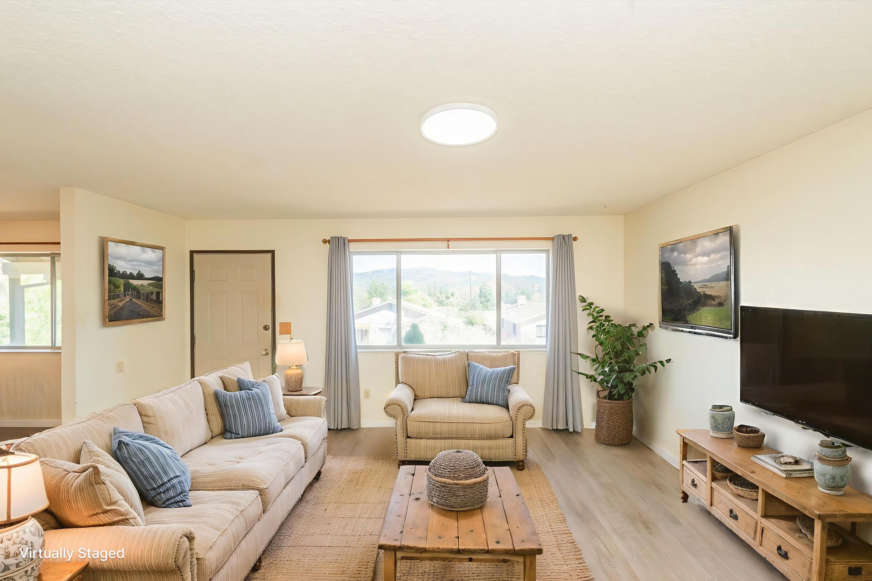 10 2nd Avenue Lewiston, CA 96052 - Photo 4 of 41 a living room with furniture and a flat screen tv