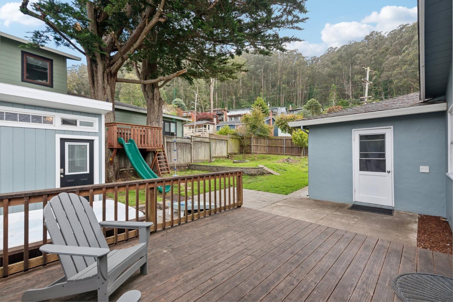 965 Monte Verde Drive Pacifica, CA 94044 - Photo 20 of 34 a view of a house with backyard and porch