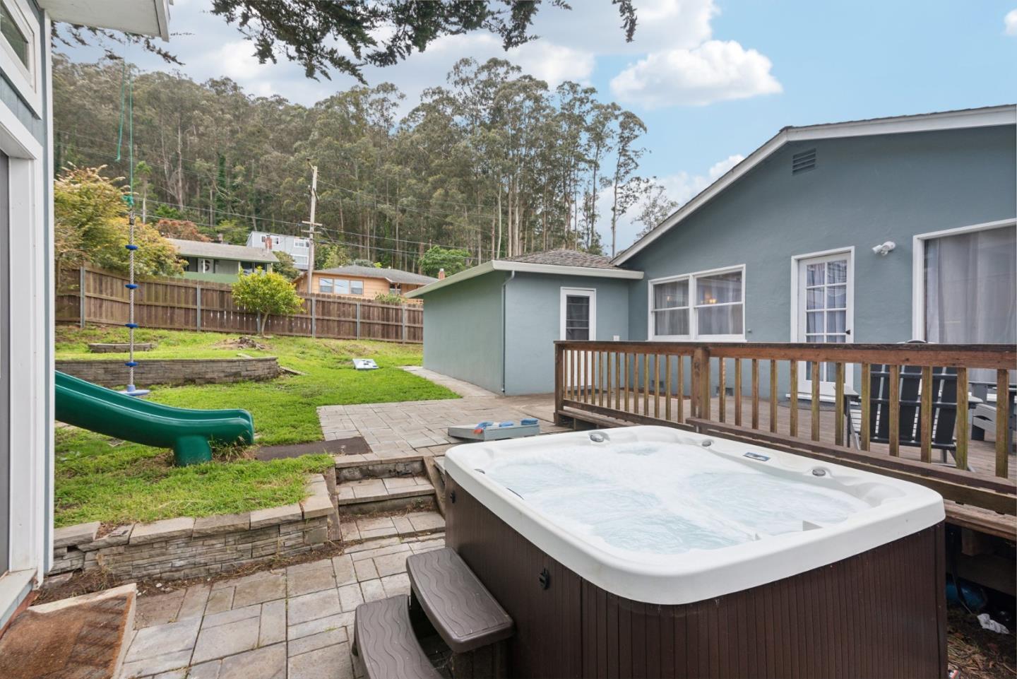 965 Monte Verde Drive Pacifica, CA 94044 - Photo 23 of 34 a view of house with backyard outdoor seating and entertaining space