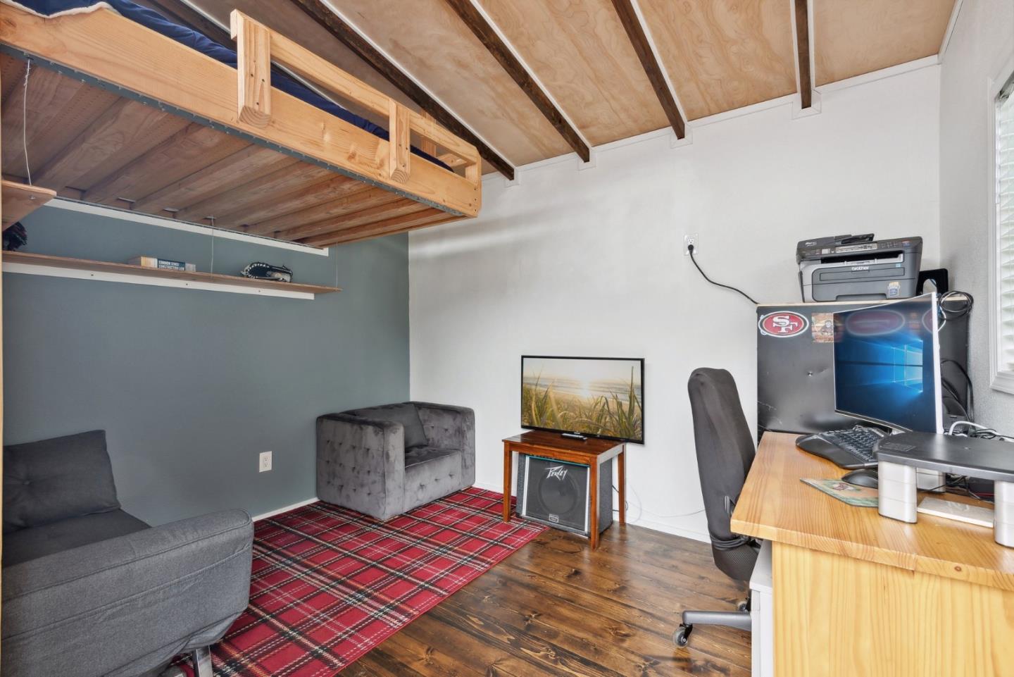 965 Monte Verde Drive Pacifica, CA 94044 - Photo 25 of 34 a bedroom with furniture and a bed