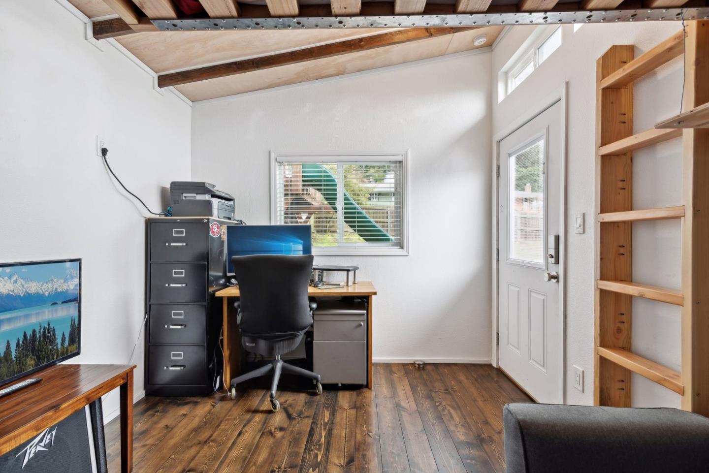 965 Monte Verde Drive Pacifica, CA 94044 - Photo 26 of 34 a view of a workspace with furniture and wooden floor