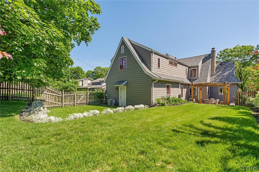 108 Shirley Road Syracuse, NY 13224 - Photo 41 of 50 Fully Fenced Backyard, paver patio with pergola