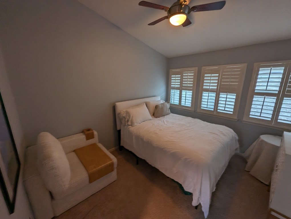 208 Crescent Bluff Lakeway, TX 78734 - Photo 11 of 21 a bedroom with a bed and window