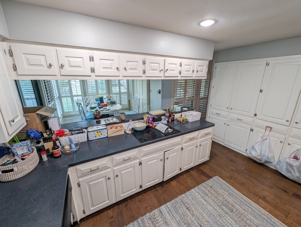 208 Crescent Bluff Lakeway, TX 78734 - Photo 15 of 21 a kitchen with granite countertop lots of clutter and washer