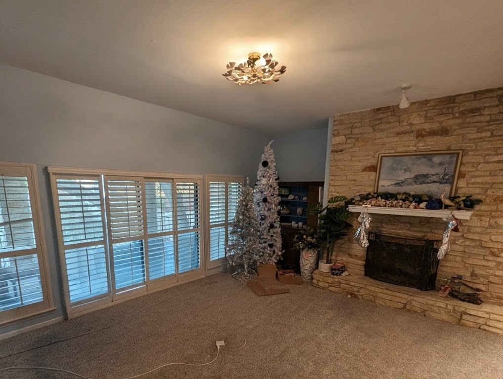 208 Crescent Bluff Lakeway, TX 78734 - Photo 4 of 21 a view of a livingroom with a fireplace