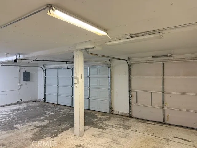 a bathroom with a sink toilet and a mirror