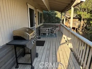 a view of balcony with furniture
