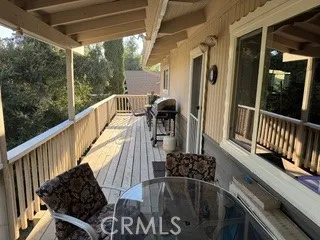 a view of balcony with furniture