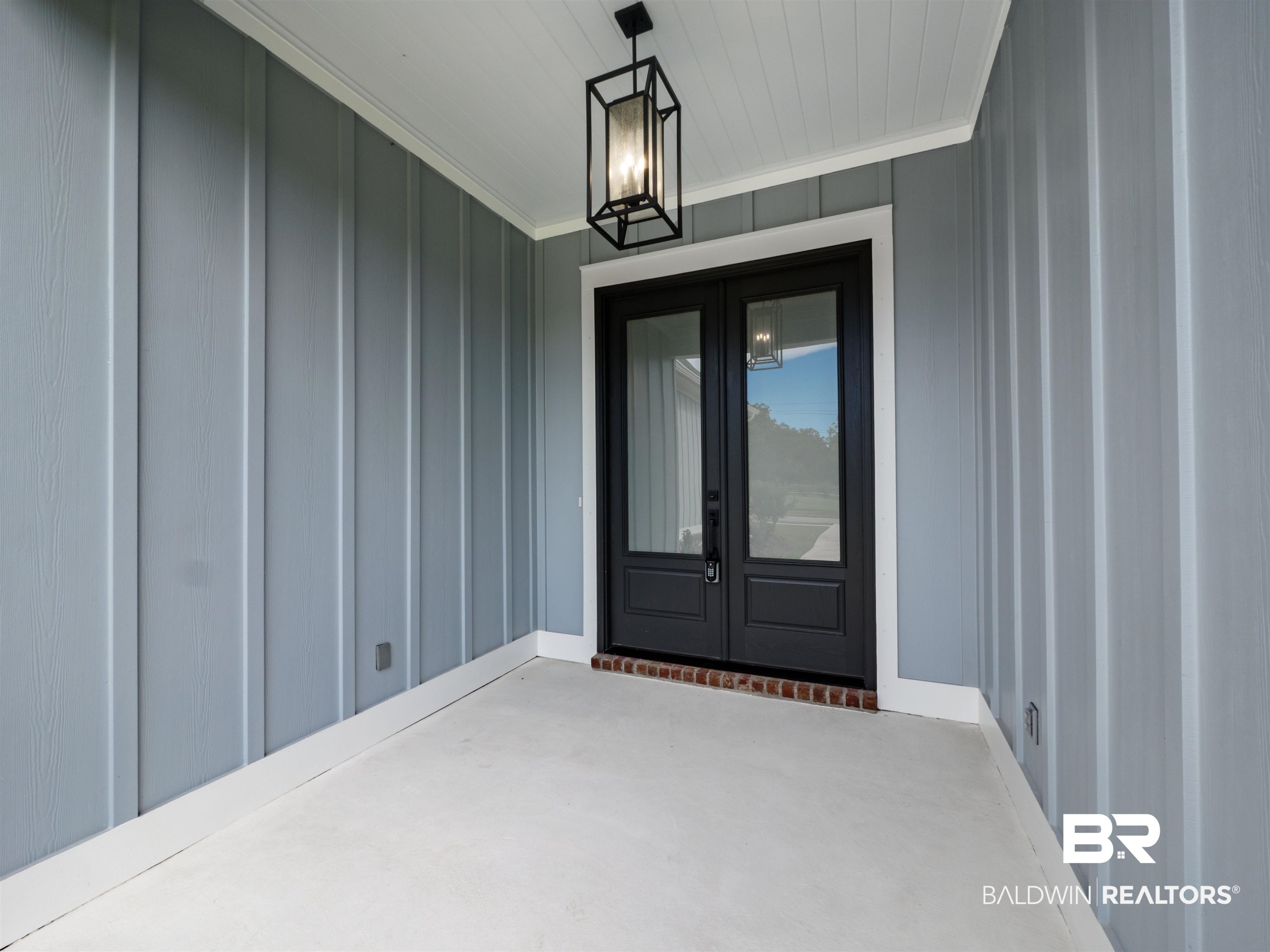 10912 Catania Avenue Fairhope, AL 36532 - Photo 7 of 54 Front porch with light fixture