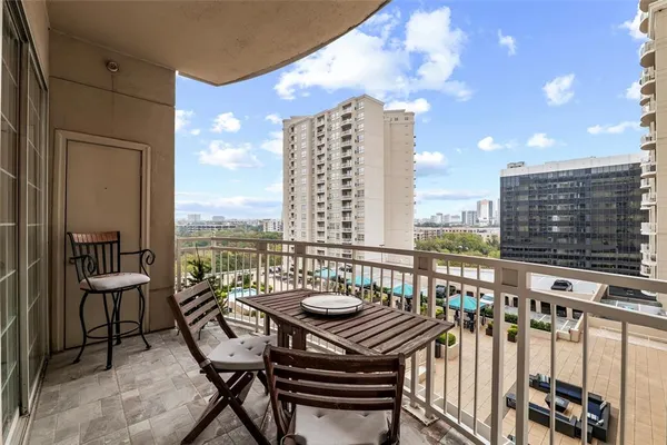 a view of a terrace with chairs