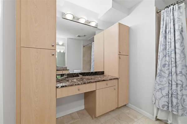 a view of cabinets with sink