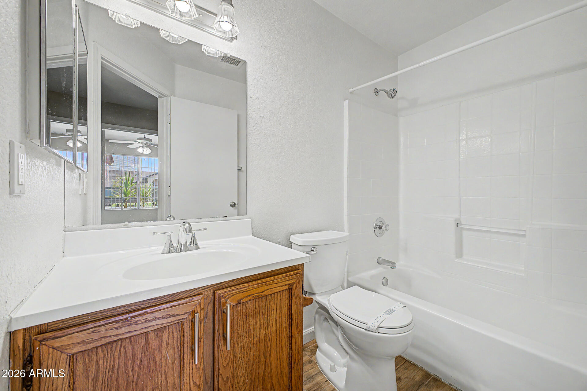 8564 West Ocotillo Road Glendale, AZ 85305 - Photo 27 of 34 a bathroom with a sink a toilet and shower
