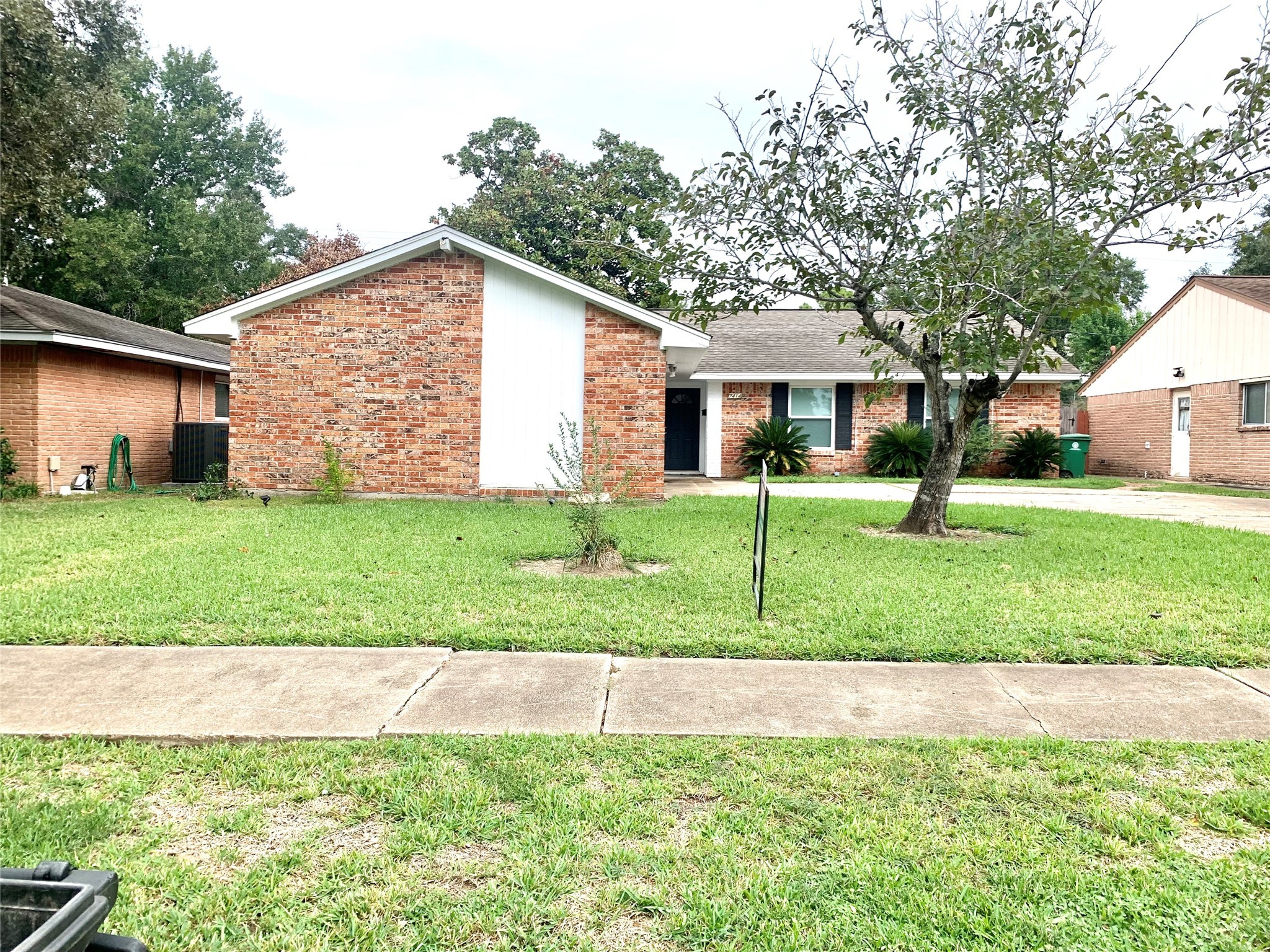 7414 Carew Street Houston, TX 77074 - Photo 3 of 15 a view of a house with a yard and plants