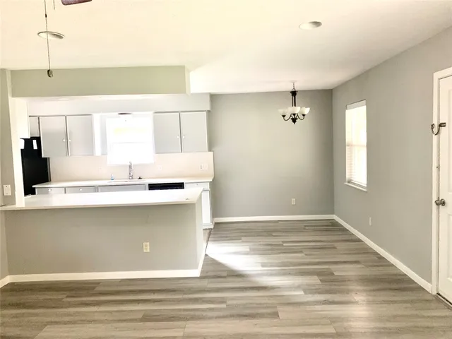 a bathroom with a sink mirror and a vanity