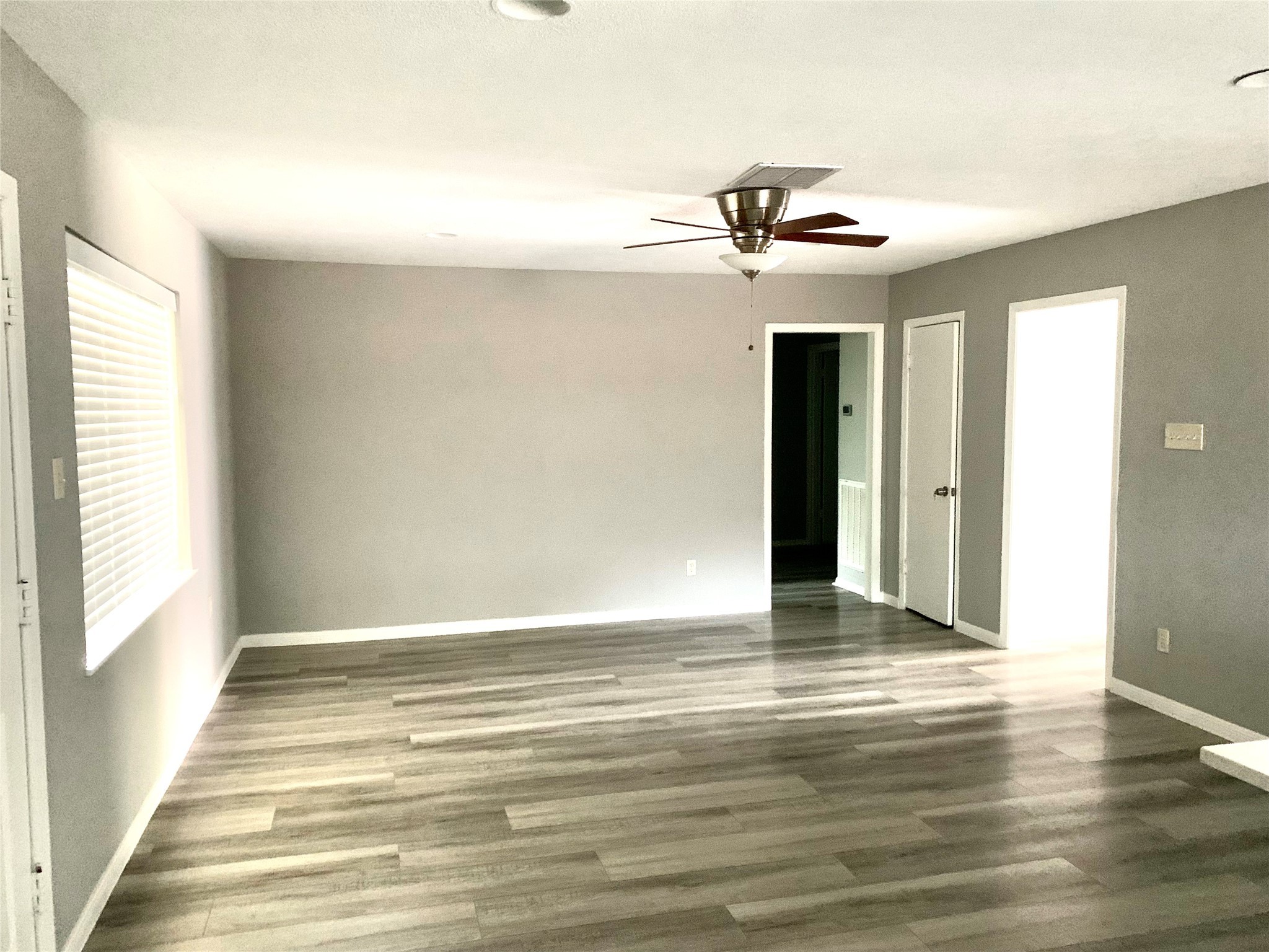 7414 Carew Street Houston, TX 77074 - Photo 8 of 15 a view of a livingroom with a ceiling fan and window