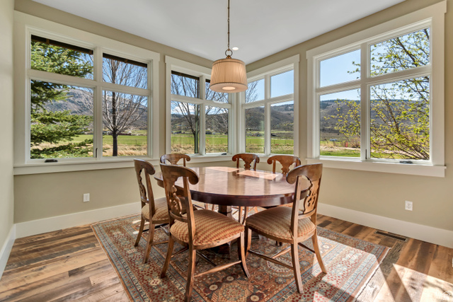 2579 Splendor Valley Road Kamas, UT 84036 - Photo 38 of 87 Dining area featuring a mountain view and wood-type flooring