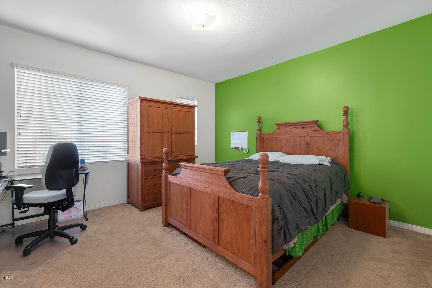 608 Flathead River Street Oxnard, CA 93036 - Photo 11 of 21 a bedroom with a bed and a chair