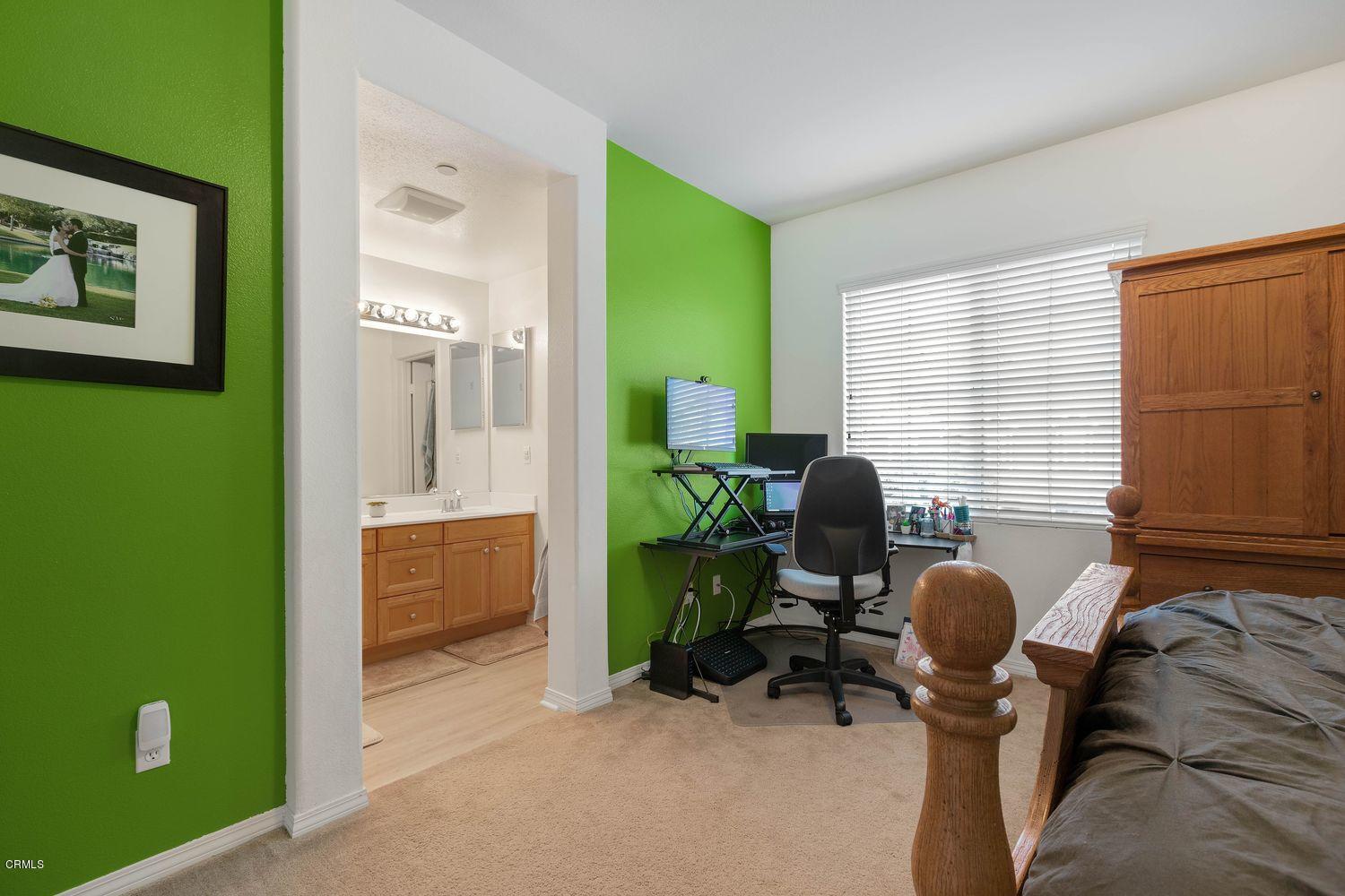 608 Flathead River Street Oxnard, CA 93036 - Photo 12 of 21 a view of a livingroom with workspace and a window