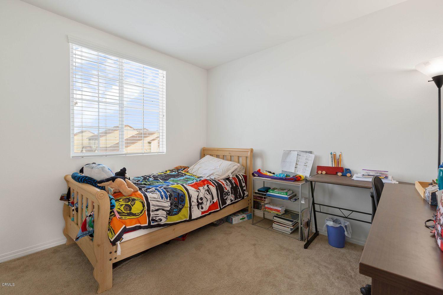 608 Flathead River Street Oxnard, CA 93036 - Photo 15 of 21 a bedroom with a bed and window