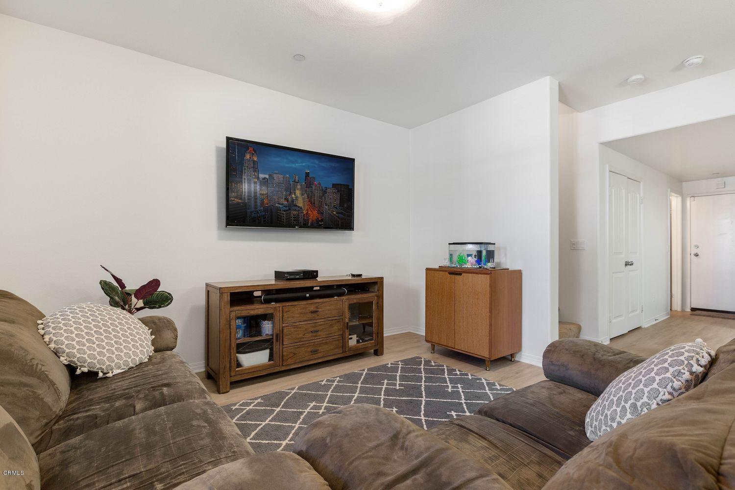 608 Flathead River Street Oxnard, CA 93036 - Photo 4 of 21 a living room with furniture and a flat screen tv