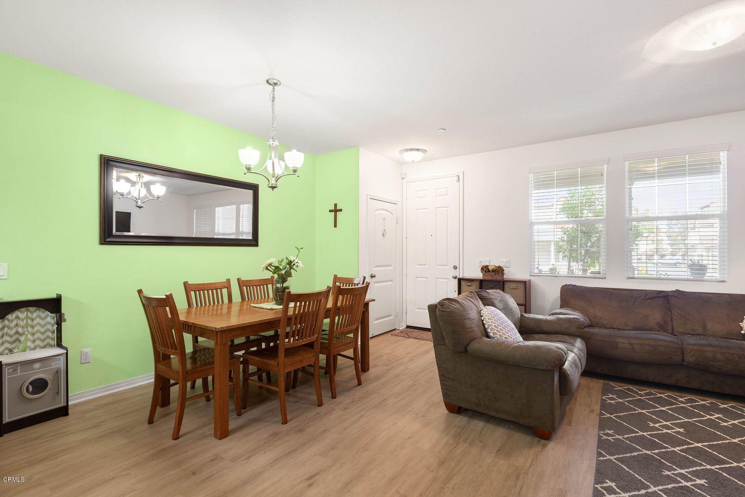 608 Flathead River Street Oxnard, CA 93036 - Photo 5 of 21 a view of a dining room with furniture window and wooden floor