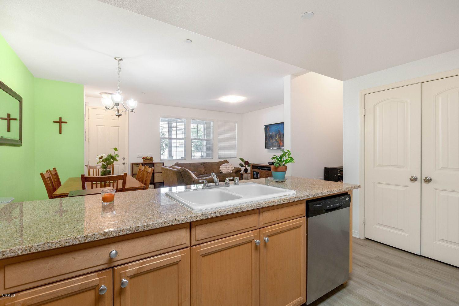608 Flathead River Street Oxnard, CA 93036 - Photo 7 of 21 a bathroom with a granite countertop sink and a mirror