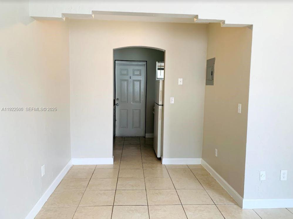 1255 Southwest 6th Street, Unit 4 Miami, FL 33135 - Photo 5 of 9 a view of a hallway to rooms