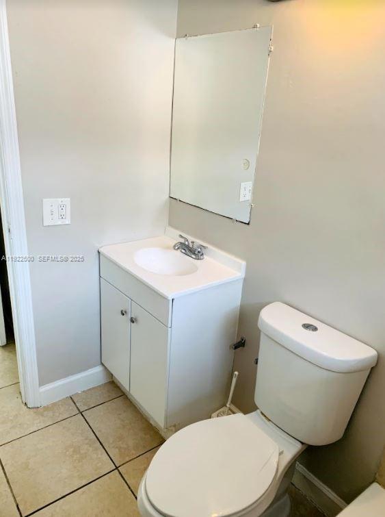 1255 Southwest 6th Street, Unit 4 Miami, FL 33135 - Photo 9 of 9 a white toilet sitting next to a bathroom sink