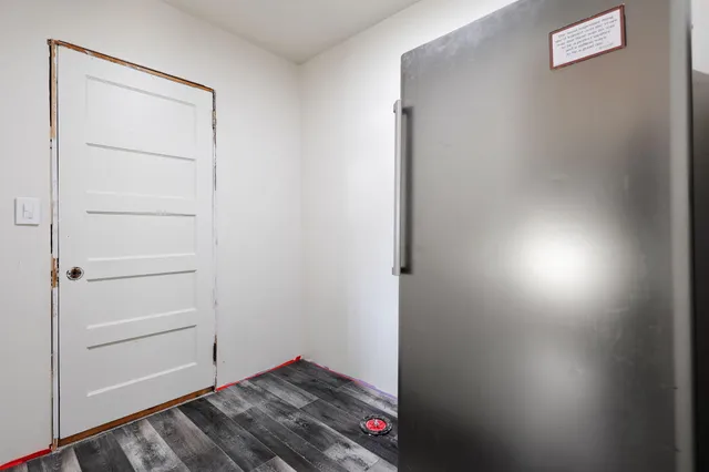a view of a livingroom with furniture and window