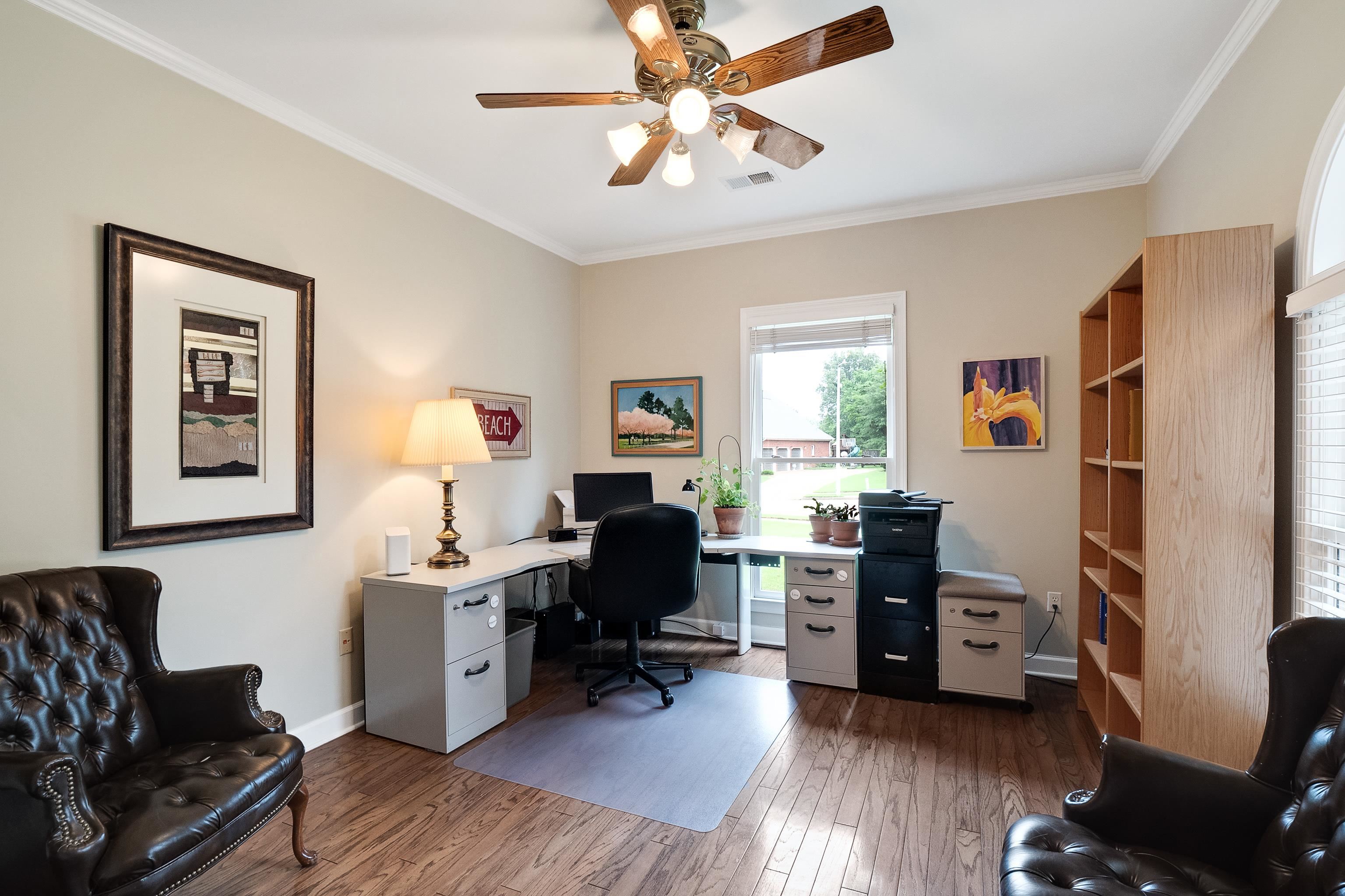 1050 Crosswinds Cove Collierville, TN 38017 - Photo 19 of 40 a view of a workspace with furniture and a window