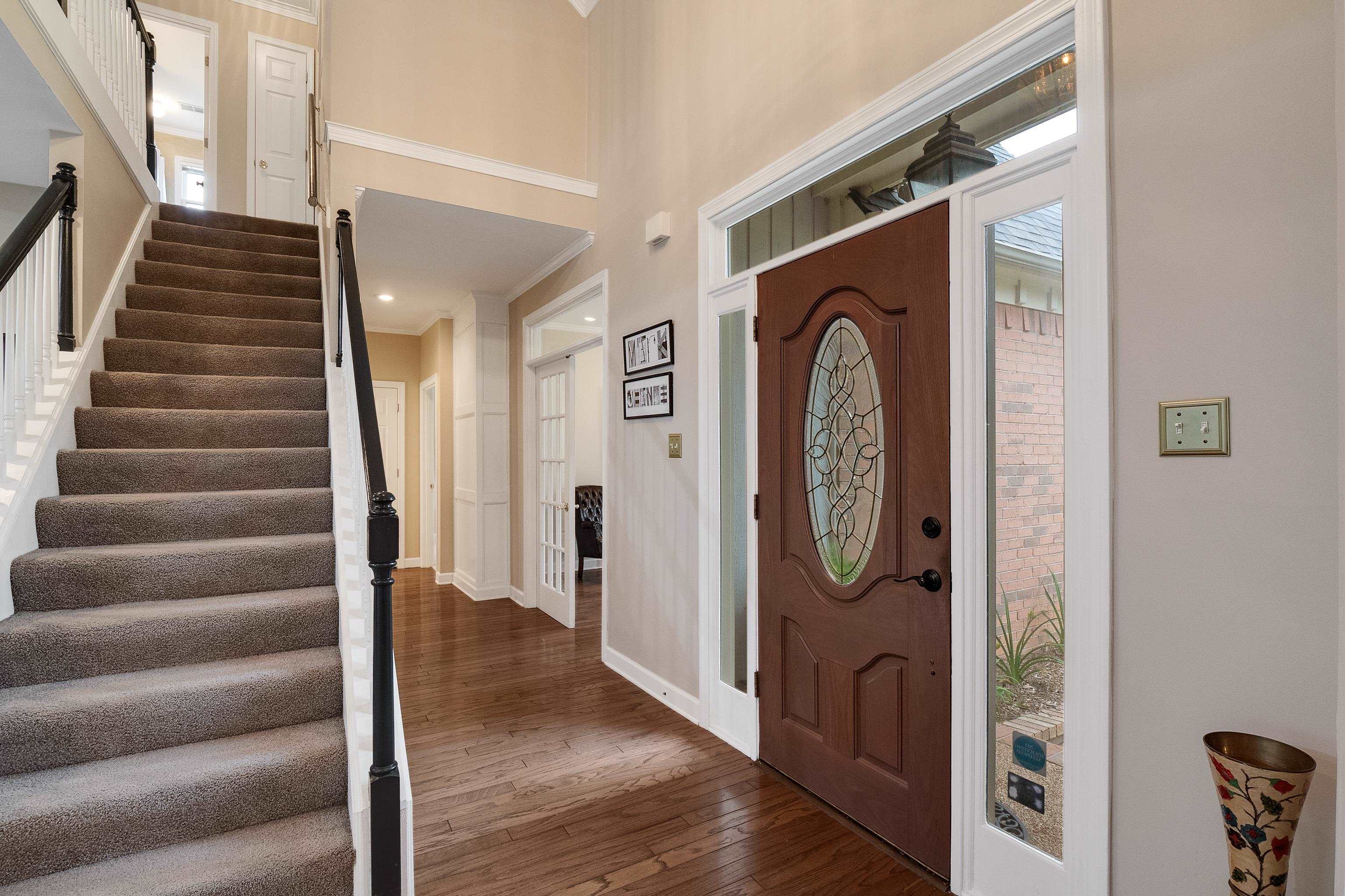 1050 Crosswinds Cove Collierville, TN 38017 - Photo 23 of 40 a view of front door with wooden door
