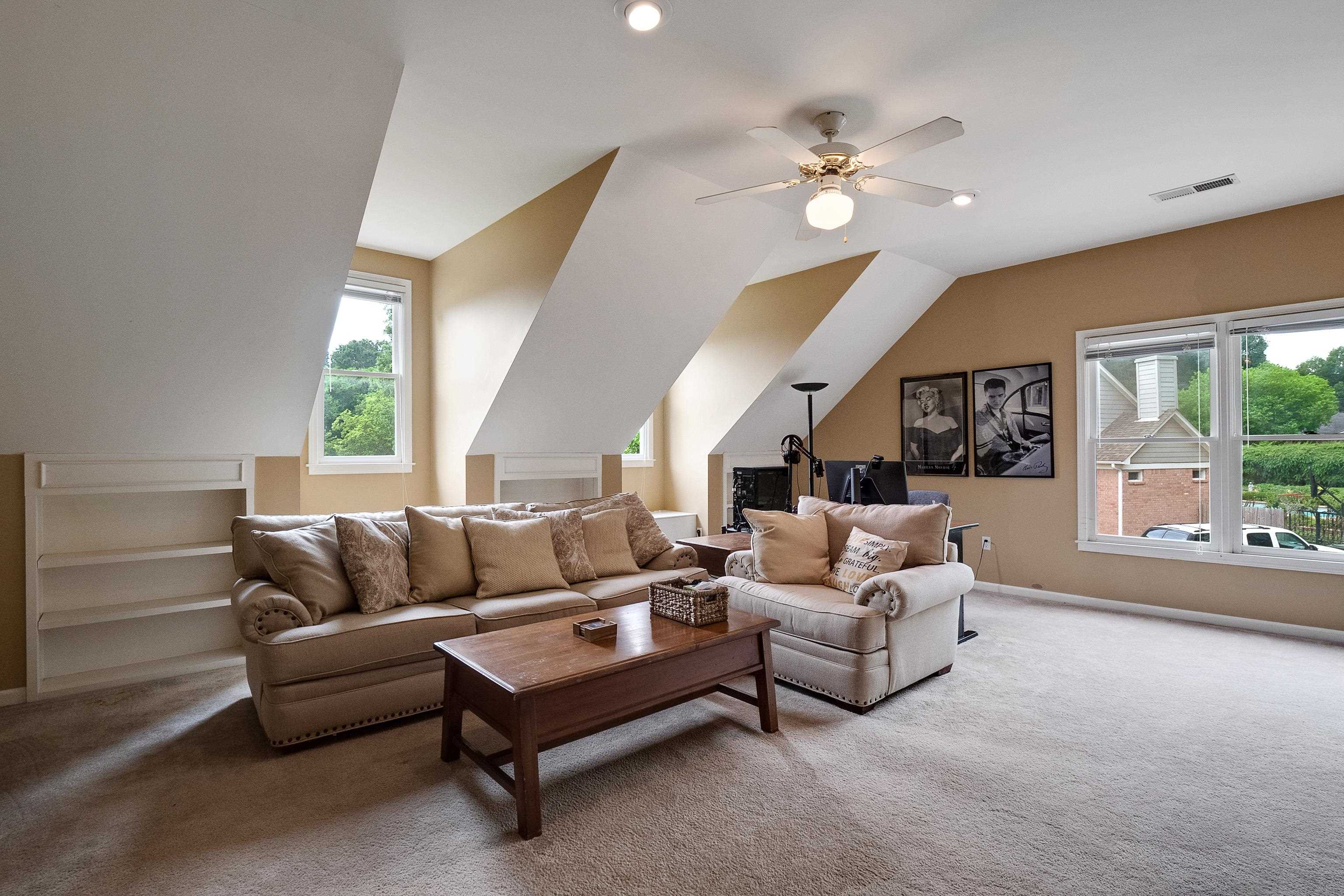 1050 Crosswinds Cove Collierville, TN 38017 - Photo 30 of 40 a living room with furniture and a large window
