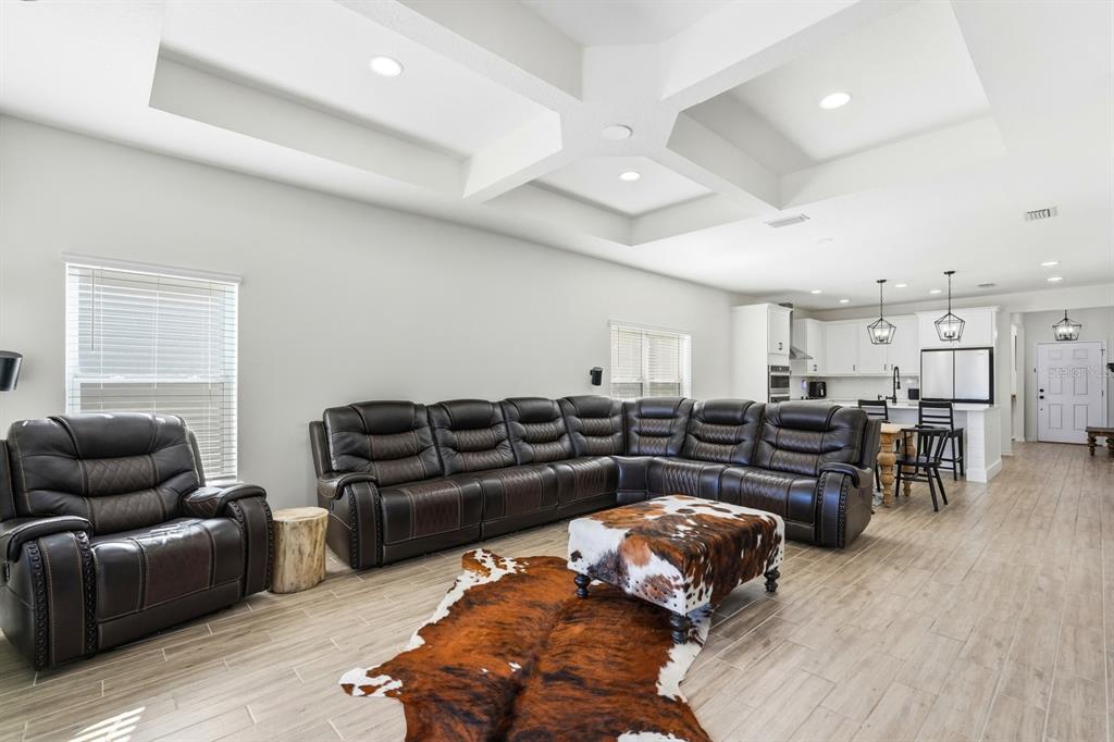 140 Nighthawk Lane Palm Coast, FL 32164 - Photo 18 of 43 a living room with furniture and wooden floor