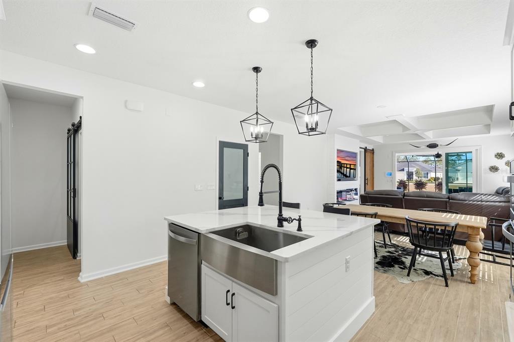 140 Nighthawk Lane Palm Coast, FL 32164 - Photo 25 of 43 a kitchen that has a lot of cabinets in it