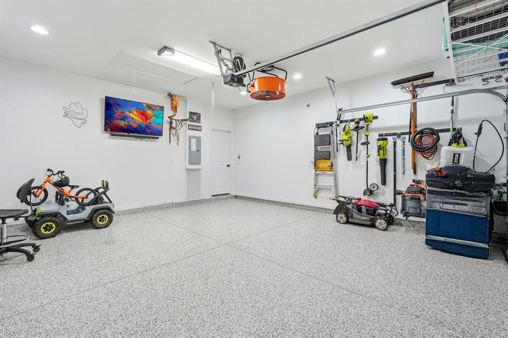 140 Nighthawk Lane Palm Coast, FL 32164 - Photo 28 of 43 a view of a room with gym equipment