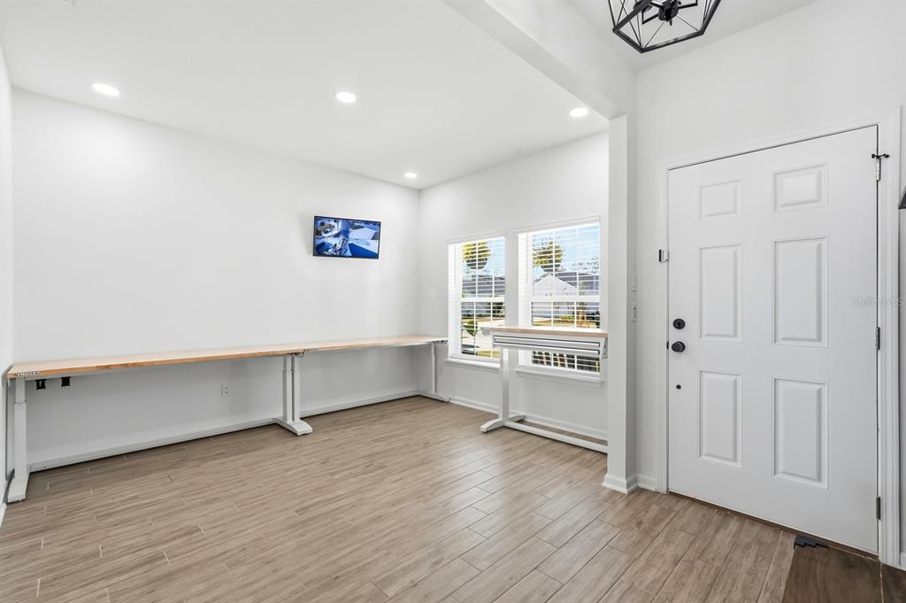 140 Nighthawk Lane Palm Coast, FL 32164 - Photo 29 of 43 a view of kitchen and wooden floor