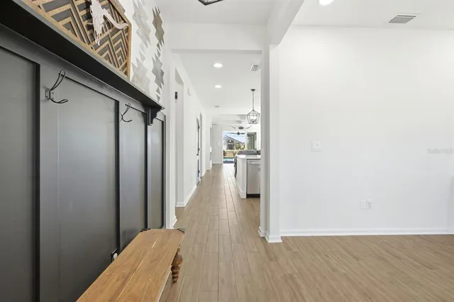 a front view of a house with a big yard