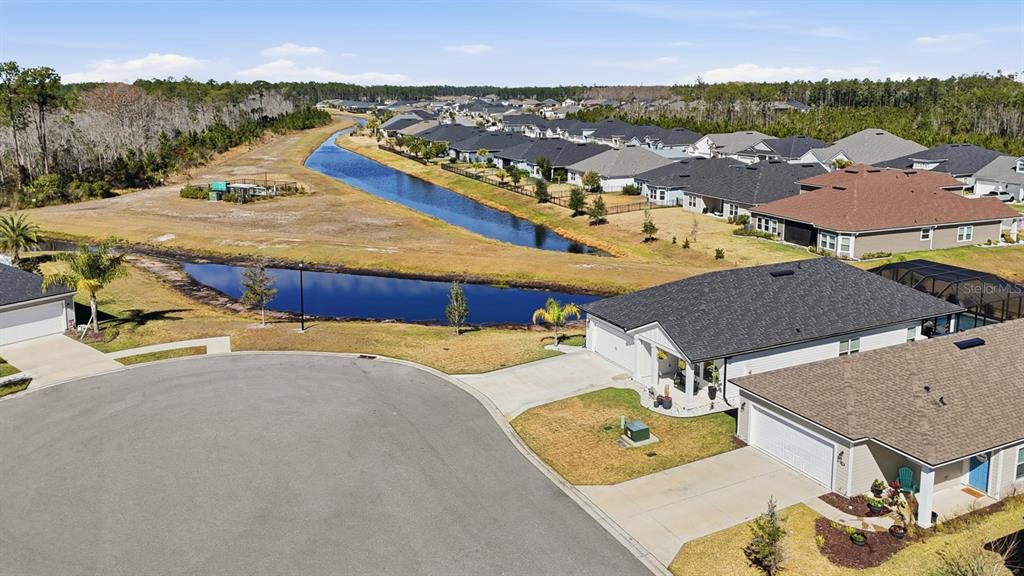 140 Nighthawk Lane Palm Coast, FL 32164 - Photo 43 of 43 an aerial view of residential houses with outdoor space