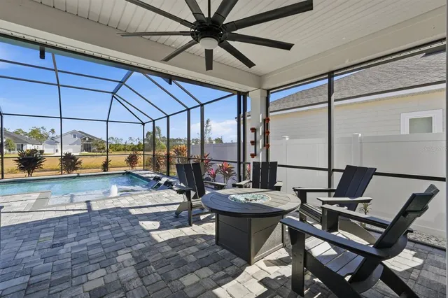 a outdoor space with lots of tables and chairs