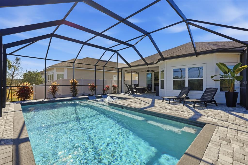 140 Nighthawk Lane Palm Coast, FL 32164 - Photo 9 of 43 a view of a backyard with sitting area