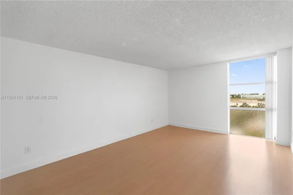a view of a big room with wooden floor