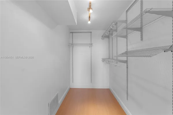 a view of a room with racks on the wall