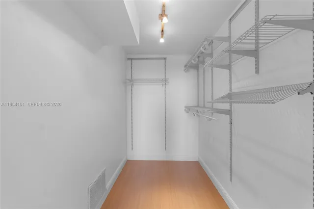 a view of a room with racks on the wall