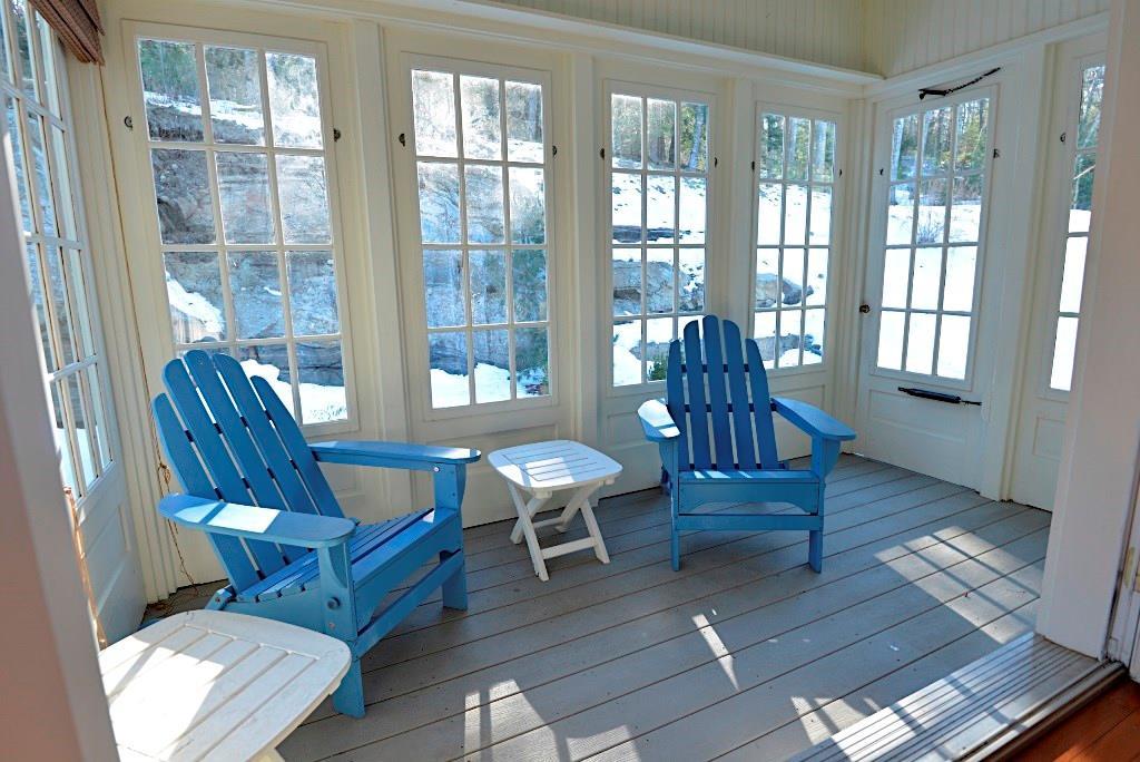 18 Harvest Ridge Road, Unit 22 Freeport, ME 04032 - Photo 17 of 35 Sunroom overlooks backyard landscape