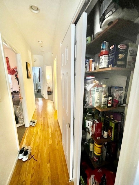 17 Thacher Street, Unit 3 Boston, MA 02113 - Photo 11 of 24 a view of a living room with closet and a floor to ceiling window